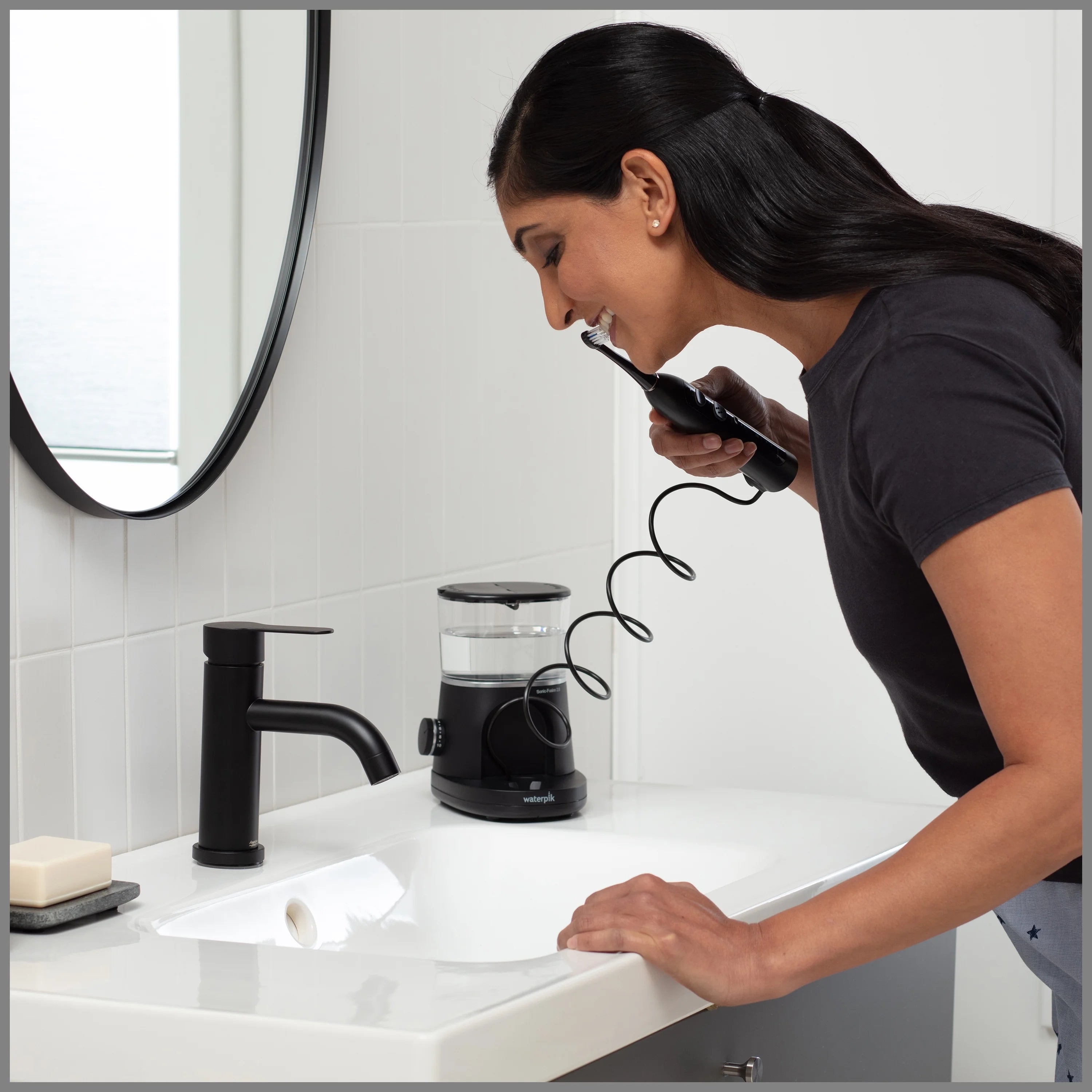 Black Electric Toothbrush and Water Flosser Combo M384